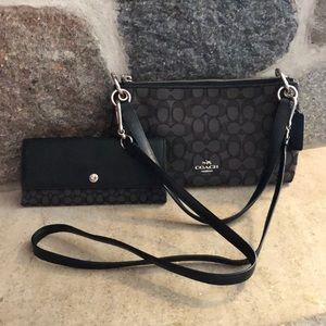Coach Black crossbody with matching wallet.